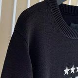 Texture and finish detail of Givenchy luxury piece style No.157
