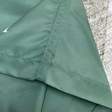 Three-quarter angle view of Amiri luxury piece style No.056