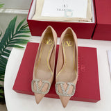 Close-up detail view of Valentino Garavani luxury piece style No.220