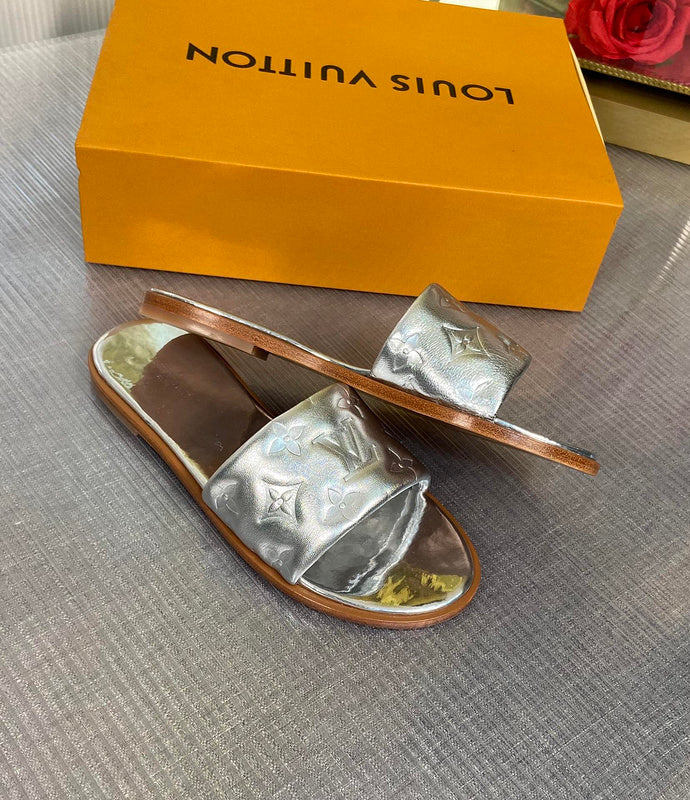 Louis Vuitton Nude Ankle Boots - Angled View