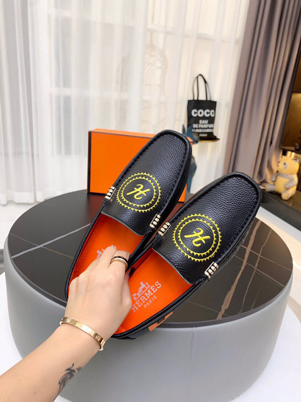 Hermès Chocolate Brown Loafer Flats - Angled View