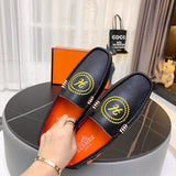 Hermès Chocolate Brown Loafer Flats - Angled View