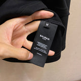 Close-up of Balmain designer clothing craftsmanship