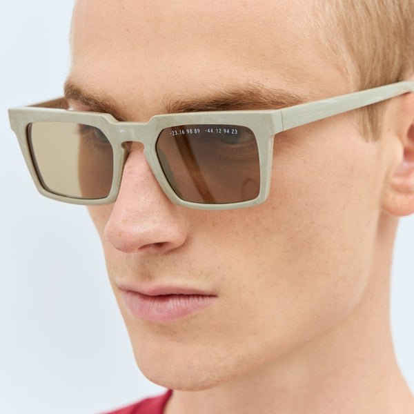 Close-up of Balenciaga sunglasses hardware and fine stitching