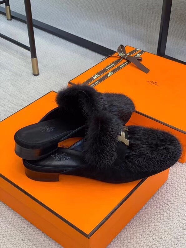 Hermès White Chelsea Boots - Angled View