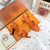 Hermès Black Gladiator Sandals - Heel Detail View