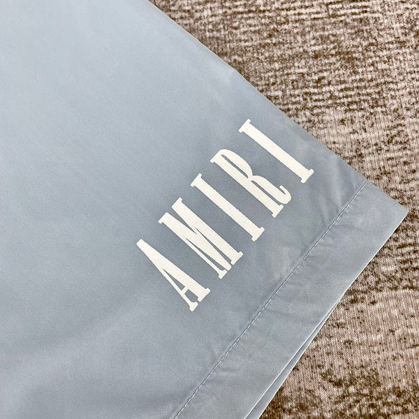 Three-quarter angle view of Amiri luxury piece style No.079