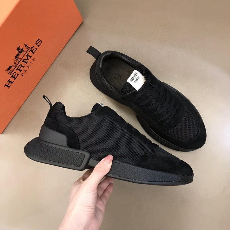 Hermès Beige Chelsea Boots - Angled View