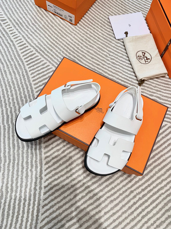 Hermès Black Crisscross Strap Sandals - Sole Detail View