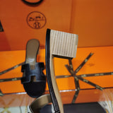 Hermès Black Ankle Strap Sandals - Close-Up Texture View