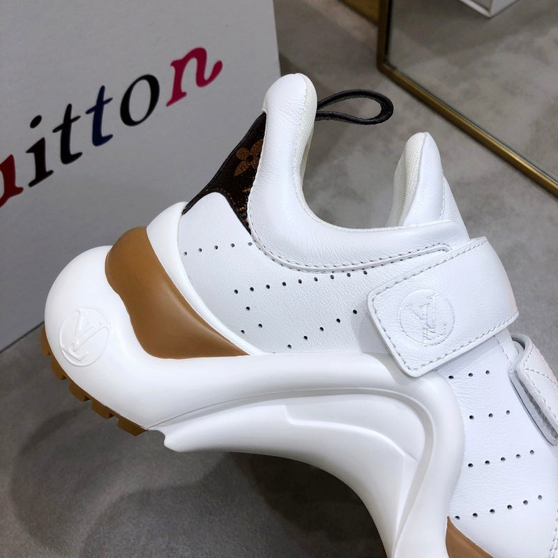 Louis Vuitton Beige Knee-High Boots - Angled View