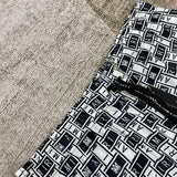 Close-up detail view of Amiri luxury piece style No.086