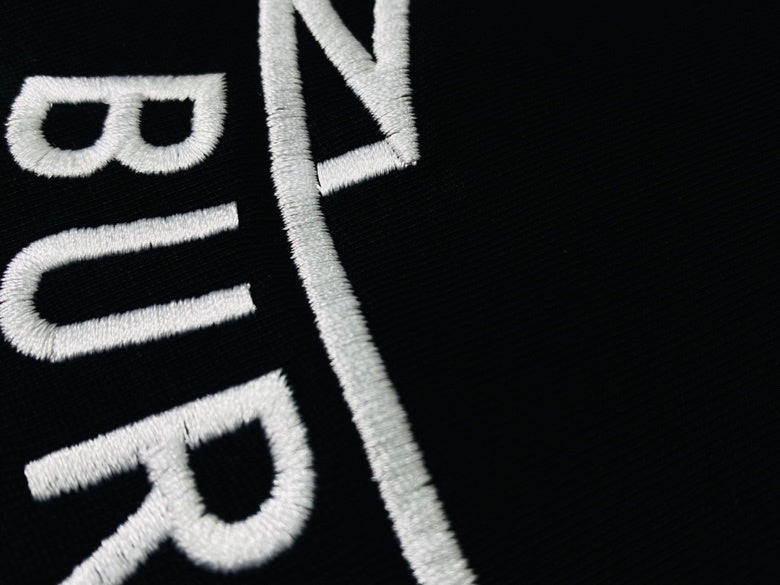 Close-up of Burberry t-shirt craftsmanship