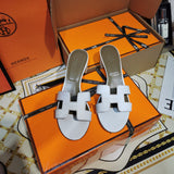 Hermès Tan Gladiator Sandals - Angled View