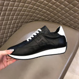 Hermès Camel Slip-On Sneakers - Lifestyle Styling Shot