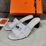 Hermes sandals Style 166 - close-up of statement logo accent