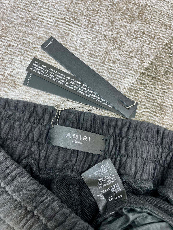 Texture and finish detail of Amiri luxury piece style No.073