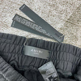 Texture and finish detail of Amiri luxury piece style No.073
