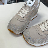 Side profile view of Miu Miu luxury piece style No.141