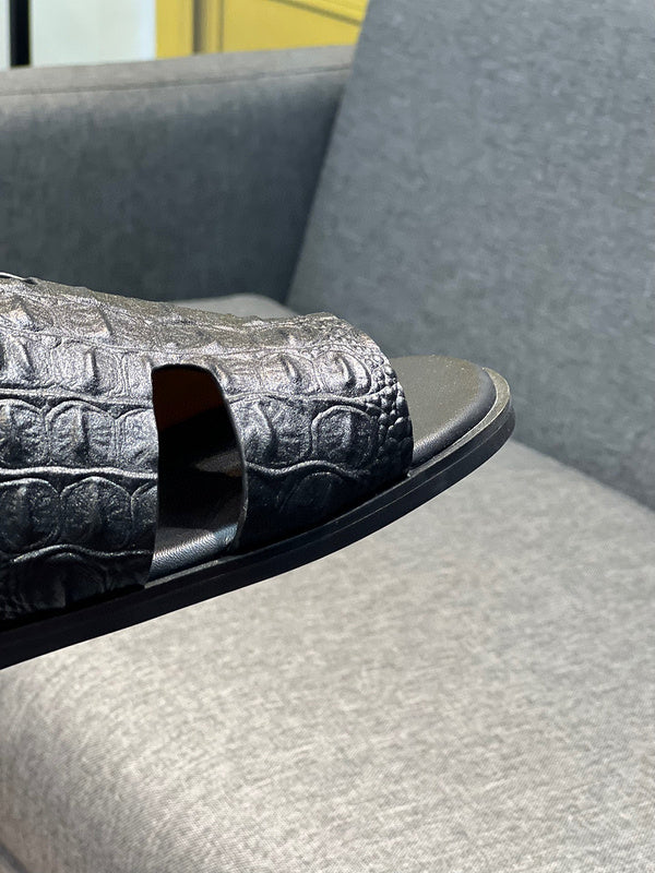 Hermes shoes Style 019 - close-up of classic monogram styling