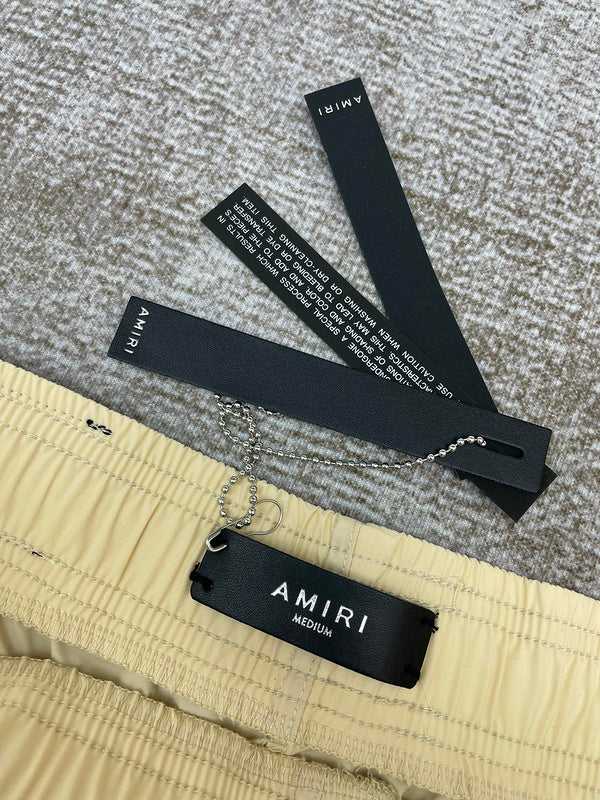 Texture and finish detail of Amiri luxury piece style No.082