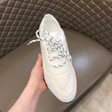 Hermes shoes Style 243 - close-up of classic monogram styling