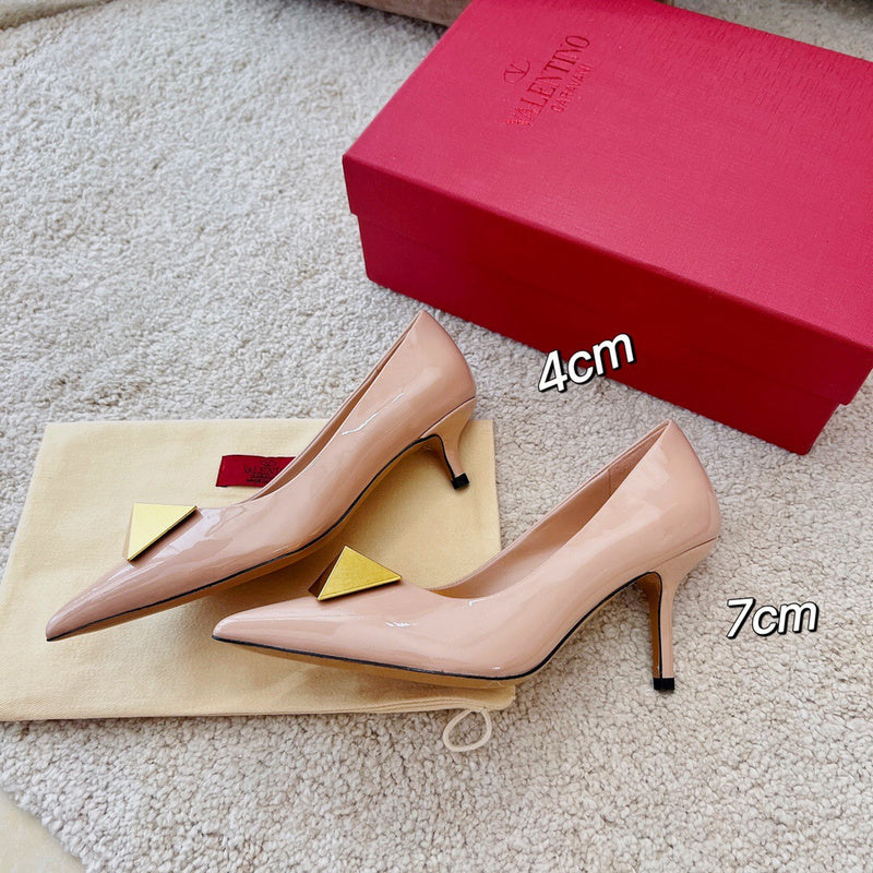 Side profile view of Valentino Garavani luxury piece style No.228