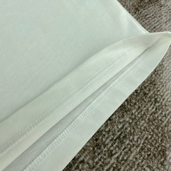 Three-quarter angle view of Amiri luxury piece style No.181