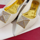 Full silhouette view of Valentino Garavani luxury piece style No.219