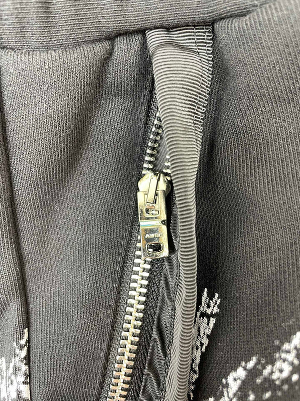 Three-quarter angle view of Amiri luxury piece style No.076