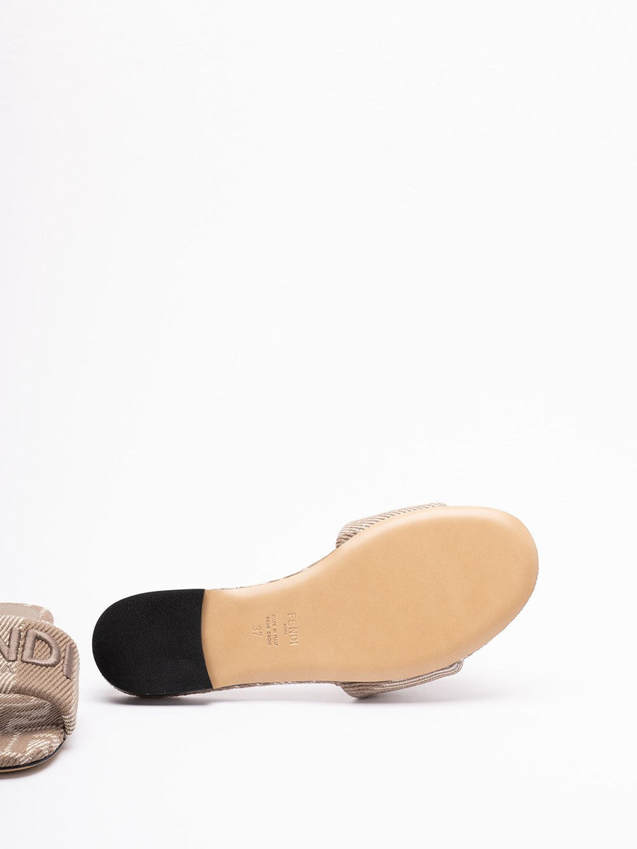 Close-up of Fendi sandals hardware and fine stitching