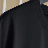 Texture and finish detail of Givenchy luxury piece style No.162