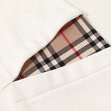 Texture and finish detail of Burberry luxury piece style No.049