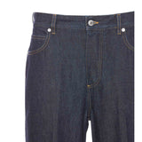 Close-up of Bottega Veneta pants hardware and fine stitching
