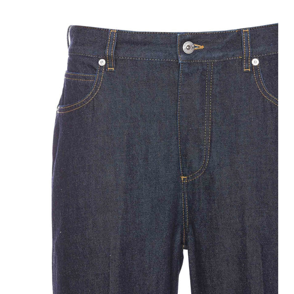 Close-up of Bottega Veneta pants hardware and fine stitching