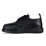 Alexander McQueen athletic side profile designer luxury fashion