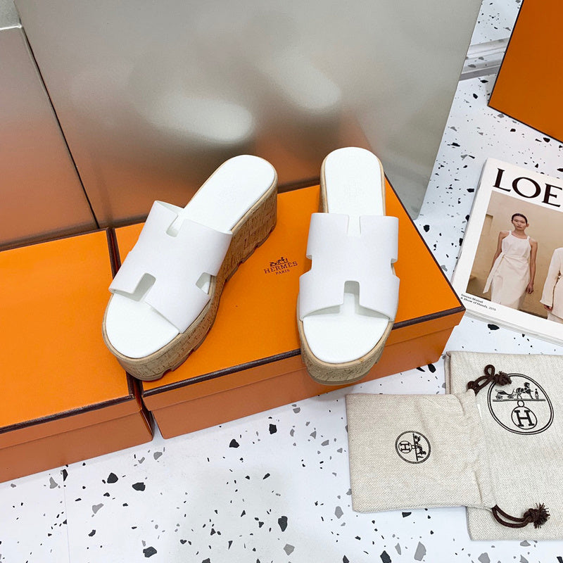 Hermès Camel Flat Thong Sandals - Angled View