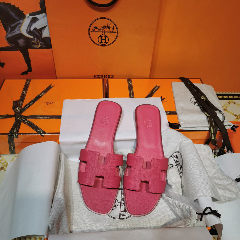 Hermès Nude Flat Thong Sandals - Angled View