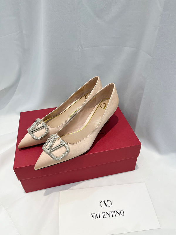 Full silhouette view of Valentino Garavani luxury piece style No.216