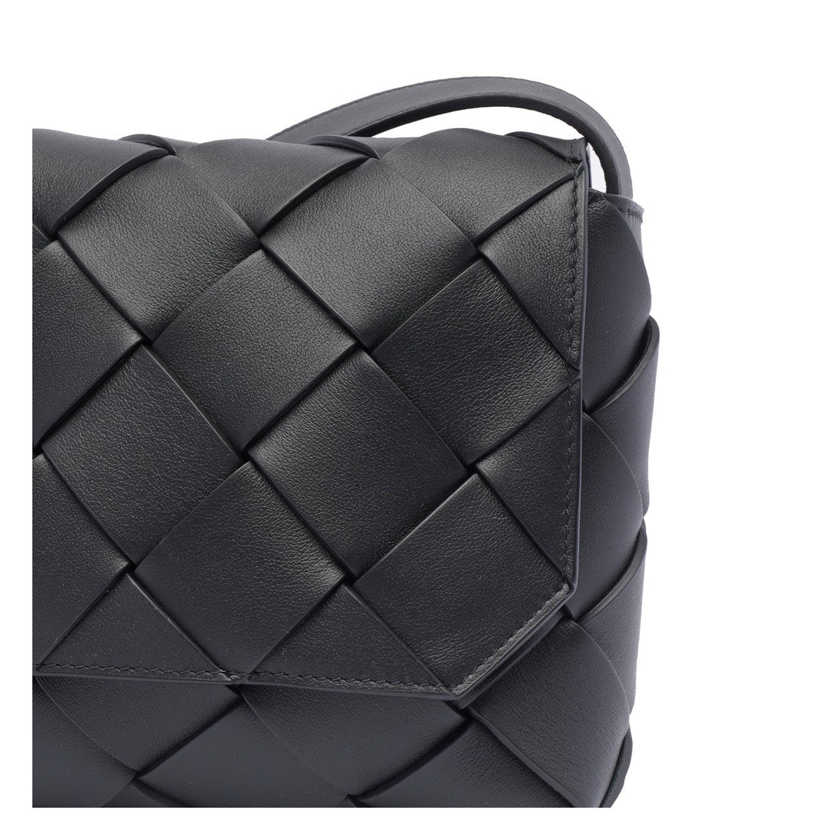 Close-up of Bottega Veneta cross body bags hardware and fine stitching