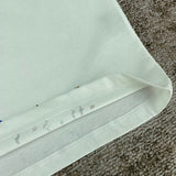 Three-quarter angle view of Amiri luxury piece style No.196