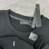 Texture and finish detail of Amiri luxury piece style No.056
