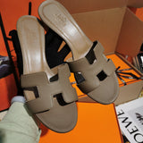 Hermès Tan Flat Thong Sandals - Sole Detail View