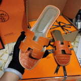 Hermès Black Slide Sandals - Front View