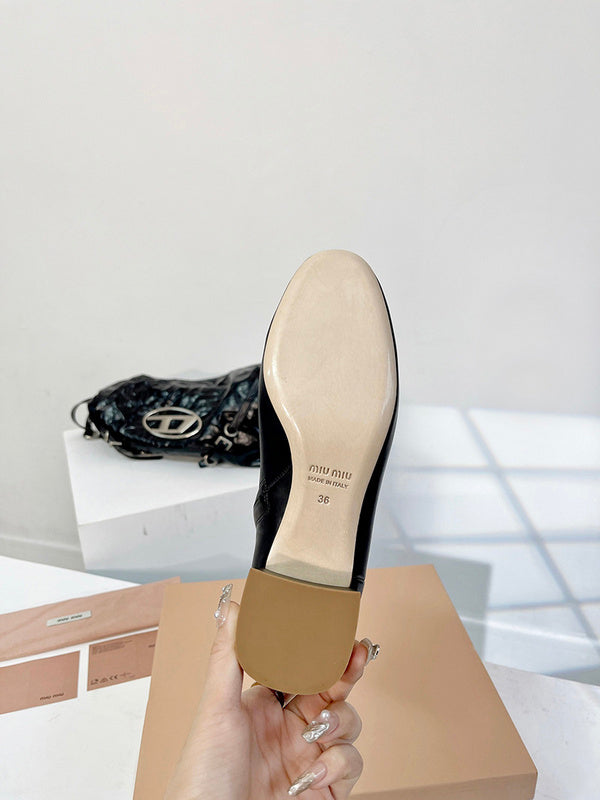Texture and finish detail of Miu Miu luxury piece style No.095