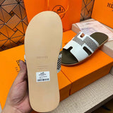 Hermès Tan Slip-On Sneakers - Angled View