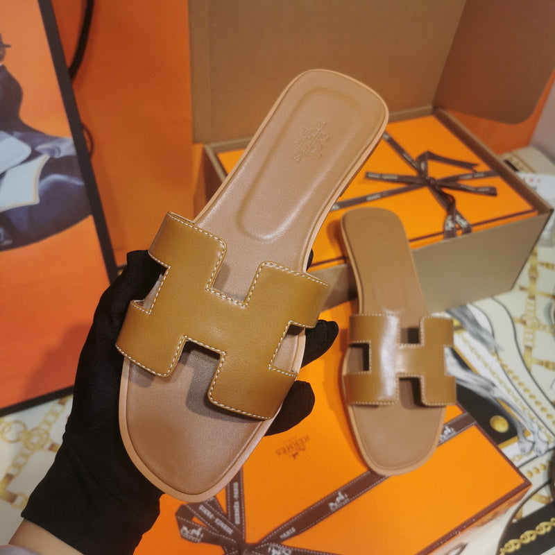 Hermes sandals Style 037 - front view, sleek modern silhouette