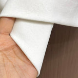 Close-up of Balmain designer clothing craftsmanship