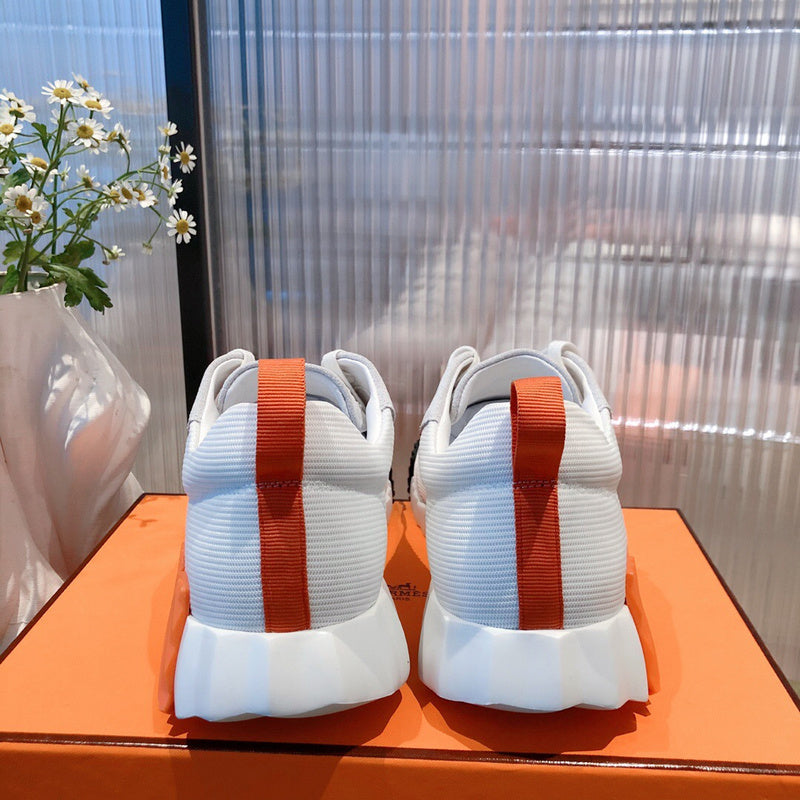 Hermès White High-Top Sneakers - Sole Detail View