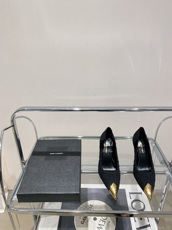 Side profile view of Saint Laurent luxury piece style No.002